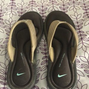 Comfy Nike flip flops size 10